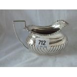 An oval half-fluted milk jug - Chester - 163gms