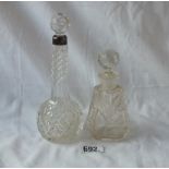 A silver mounted and cut glass vase and a scent bottle