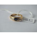 A sapphire & diamond ring in 18ct gold - size M - 3.2gms