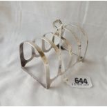 A five bar toast rack on bracket feet - stamped silver by WB