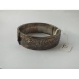 A silver bangle - 30gms