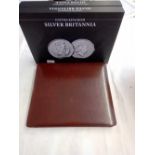 A good quality coin album and Britannia boxes