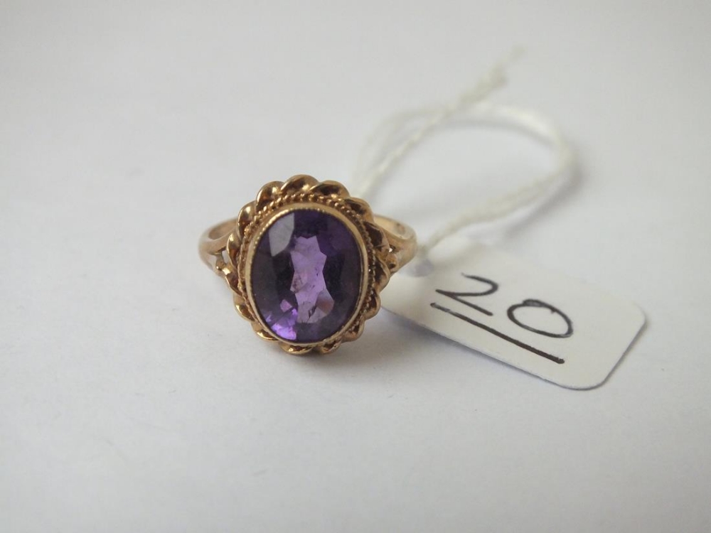 A amethyst ring with rope border in 9ct - size J - 2.5gms - Image 2 of 4