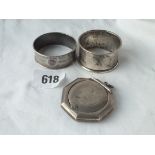 Two napkin rings and a pill box with hinged cover