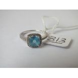 A blue stone & diamond ring in 14ct gold - size O - 2.6gms