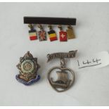 Three assorted brooches (1 x military army service corps, 1 x Danish Viking boat) etc.