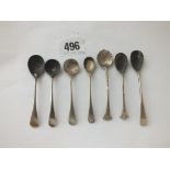 Seven various cruet spoons