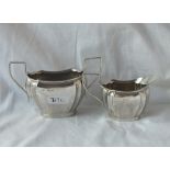 An oval shaped cream jug and matching sugar basin - Sheffield 1929 - 213gms