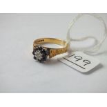 A sapphire &diamond ring in 18ct gold - size M - 4.3gms