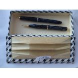 A Conway Stewart Dinkie 560 set of ladies fountian pen with 14ct gold nib & a Conway Stewart 25