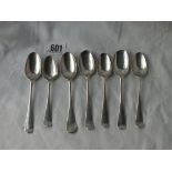 Seven c18 teaspoons with scrolled decorated backs