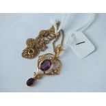 An attracive amethyst & pearl drop pendant necklace in 9ct on a rolled gold gilt link chain