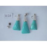 A pair of turquoise coloured earrings & matching pendant