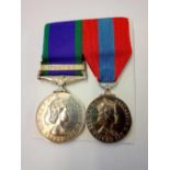 A campaign medal for Cpl S A Parker - Borneo bar - and an Imperial Service medal - boxed with