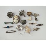 A bag of assorted & other brooches including cameo's etc.
