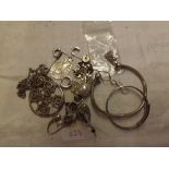 A large bag of assorted silver & other costume jewellery