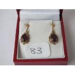 A pair of garnet earrings (to match bracelet above) in 9ct
