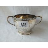 A two-handled Art Deco style sugar bowl - 6.5" over handles - Birmingham 1936, 137 gms.