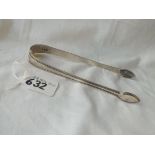 A pair of Georgian thread pattern sugar tongs by script JW