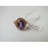 A amethyst ring with rope border in 9ct - size J - 2.5gms
