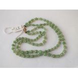 An Edwardian jade & crystal bead necklace with 9ct clasp