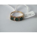A emerald & diamond ring in 18ct gold - size Q - 3gms