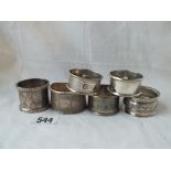 A group of six various napkin rings - 123 gms.