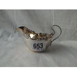 A small sauce boat with scroll handle - Sheffield 1906