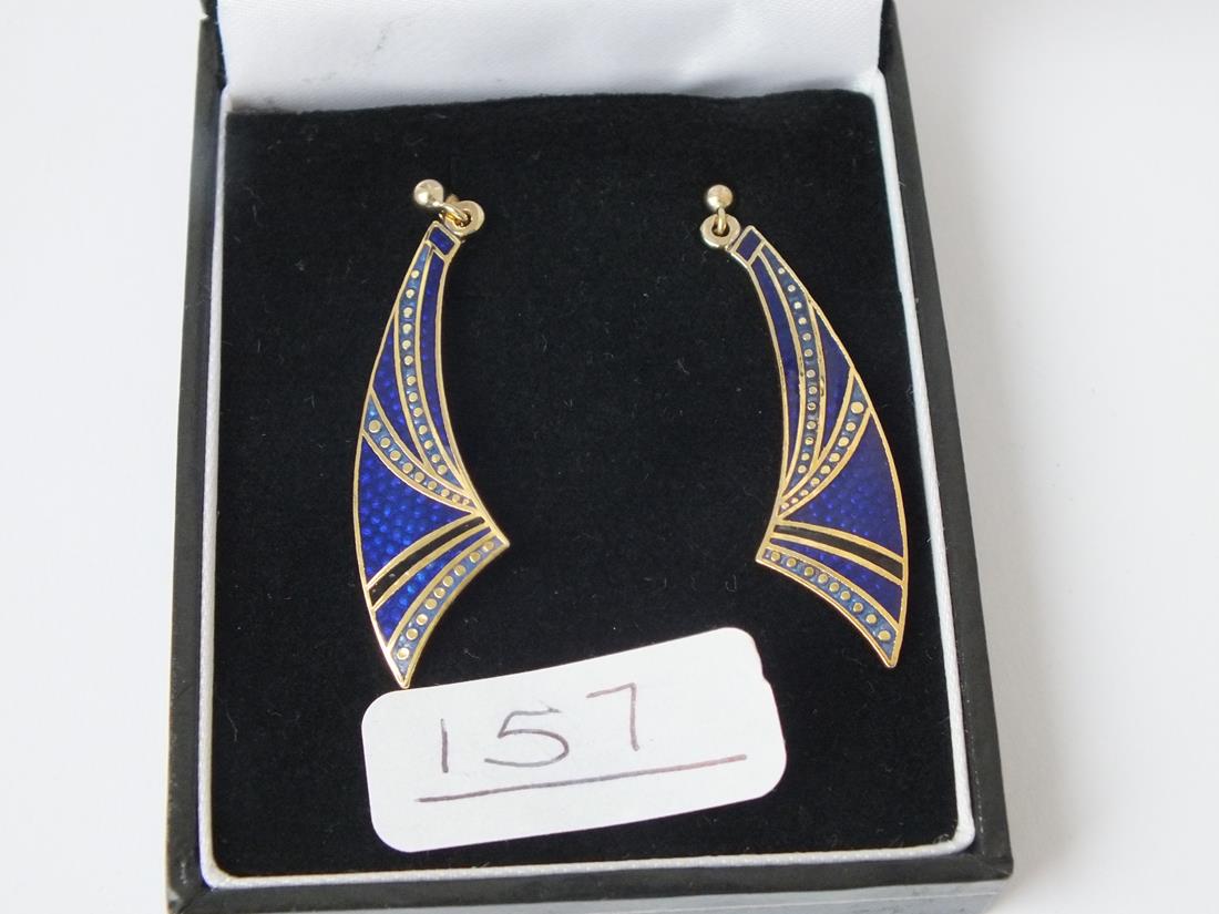 A pair of blue enamel earrings in 9ct