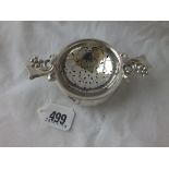 A stylish Asprey tea strainer on stand - London 1935