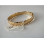 A rolled gold bangle