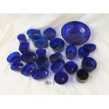 A box of blue glass liners for salts, etc