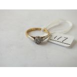 A gold & platinum set diamond solitaire ring (35pts) in 18ct gold - size O