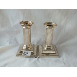 A pair of candlesticks with beaded edge and, detachable nozzles - 5" high - one Edinburgh 1893,