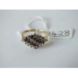 A large garnet & CZ ring in 9ct - size O - 3gms
