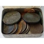 A tin of old coins