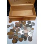 Wooden box of coins