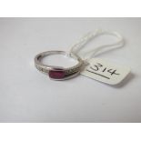 A red stone & diamond ring in 9ct - size O - 1.9gms