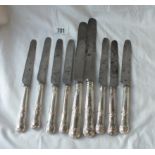 A set of nine Georgian knives with crested handles and steel blades - 1825 etc.