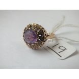 A large amethyst ring in 9ct - size M - 5.1gms