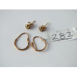 Two pairs of ear studs in 9ct - 1.2gms