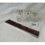 Three silver mounted cruet bottle and a comb