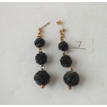 A pair of carved jet earrings
