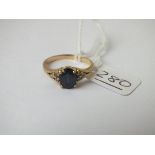 A sapphire & diamond cluster ring in 18ct gold - size R