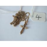 A cross penant necklace in 9ct - 3.4gms