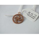 A pendant in the form of a Swastika in 9ct