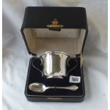 A boxed christening bowl and spoon - Birmingham 1912 by WA, 151 gms.