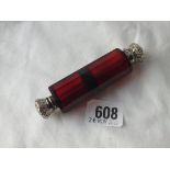 A ruby glass double-ended scent bottle with screw and hinged covers - 4" long