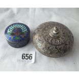 A silver and enamel decorated Eastern box - 2"DIA - and a jar with cover stamped silver