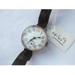 A 1920's silver cased wrist watch with seconds dial